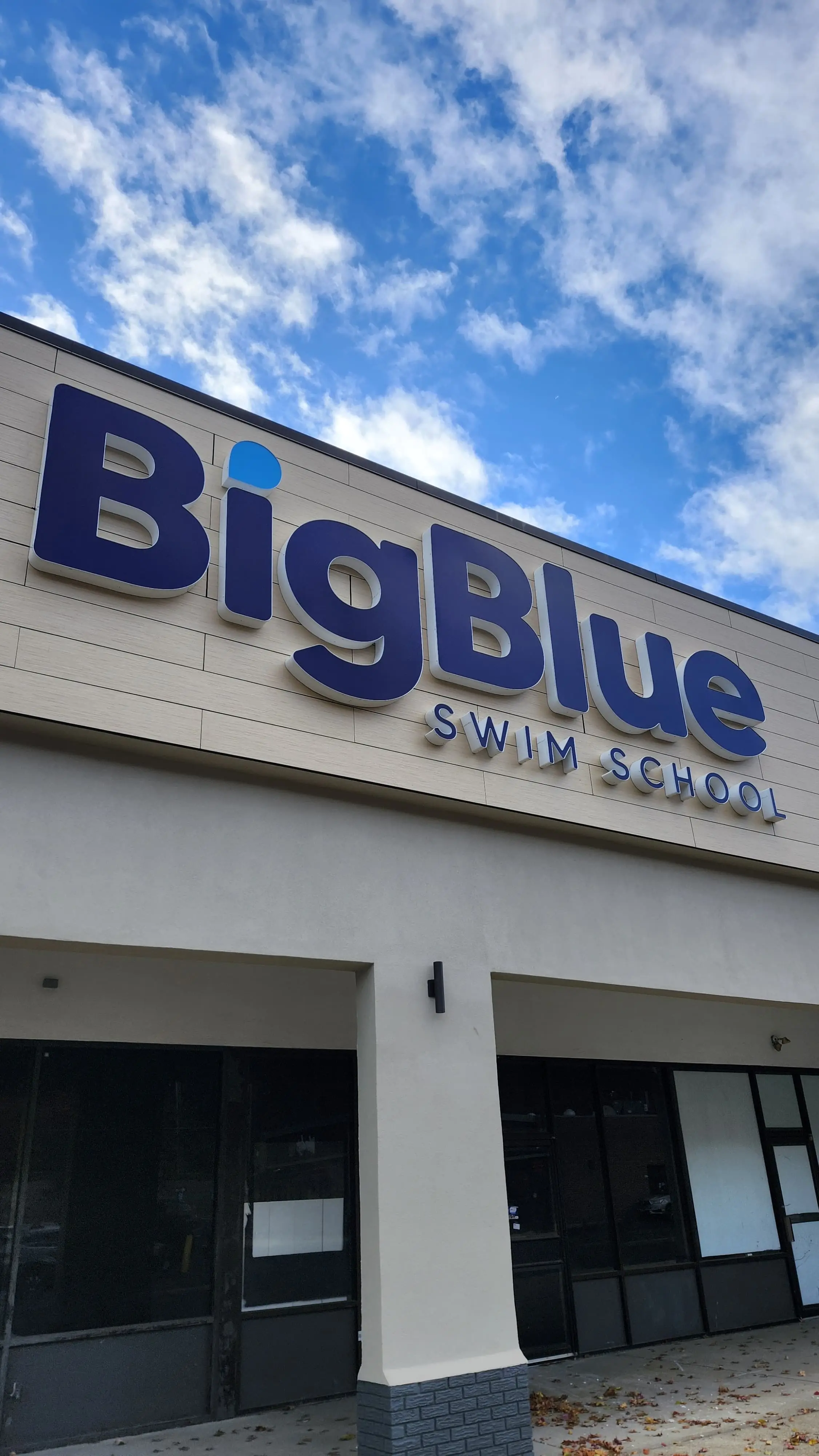 Close view of installed exterior channel letters on a storefront facade.