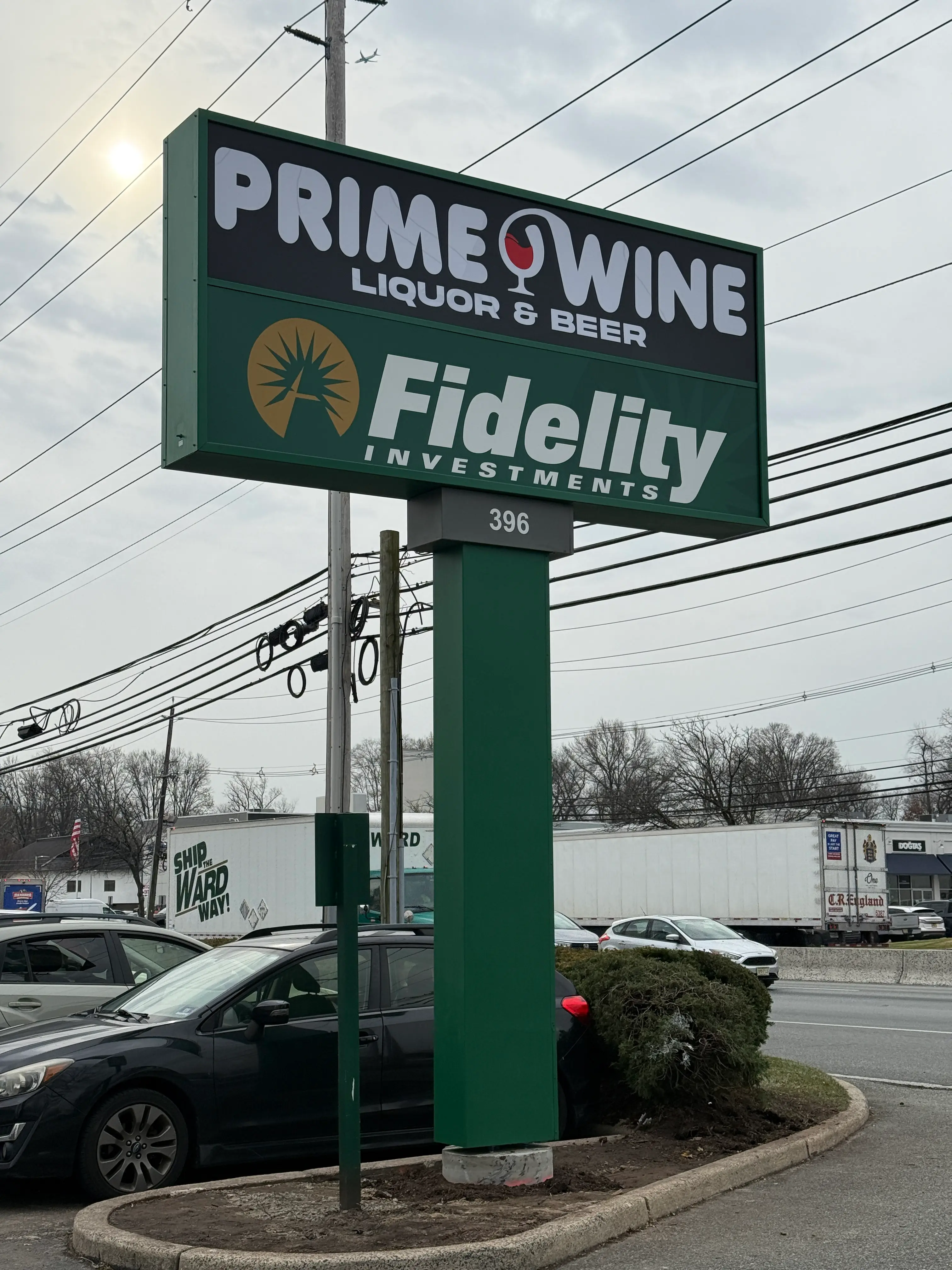 Commercial sign fieldwork at an active storefront property.